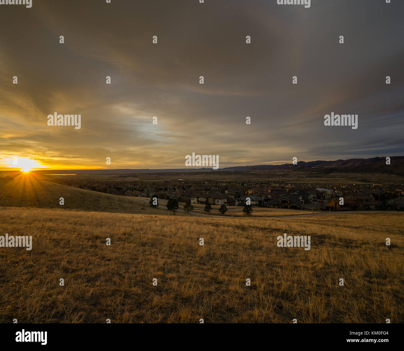 Cloudy sunrise in Lakewood, Colorado. Stock Photo