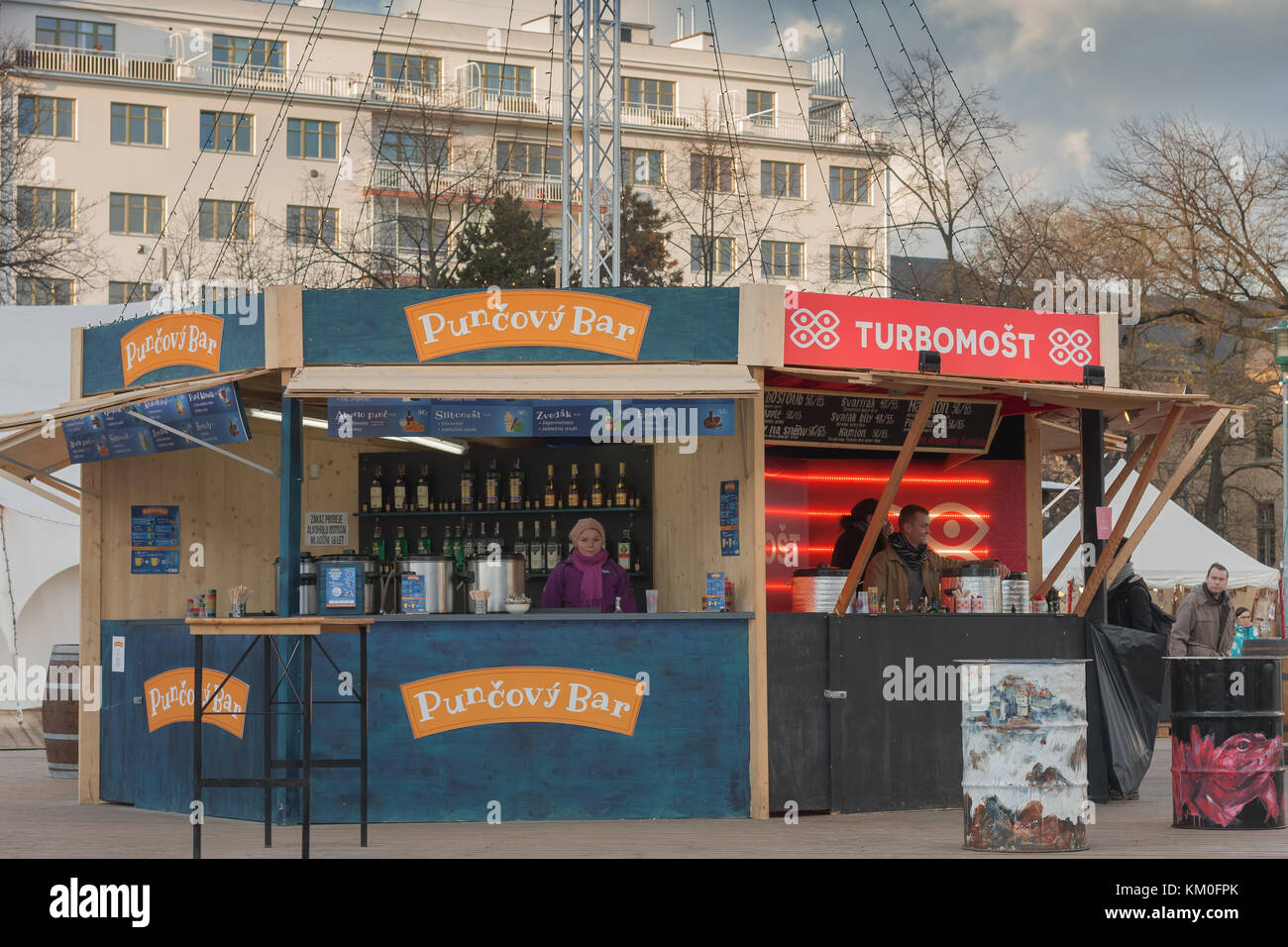 Brno,Czech Republic-November 27,2017: Saleswoman in punch bar  at Christmas market at Moravian Square on November  27, 2017 Brno, Czech Republic Stock Photo