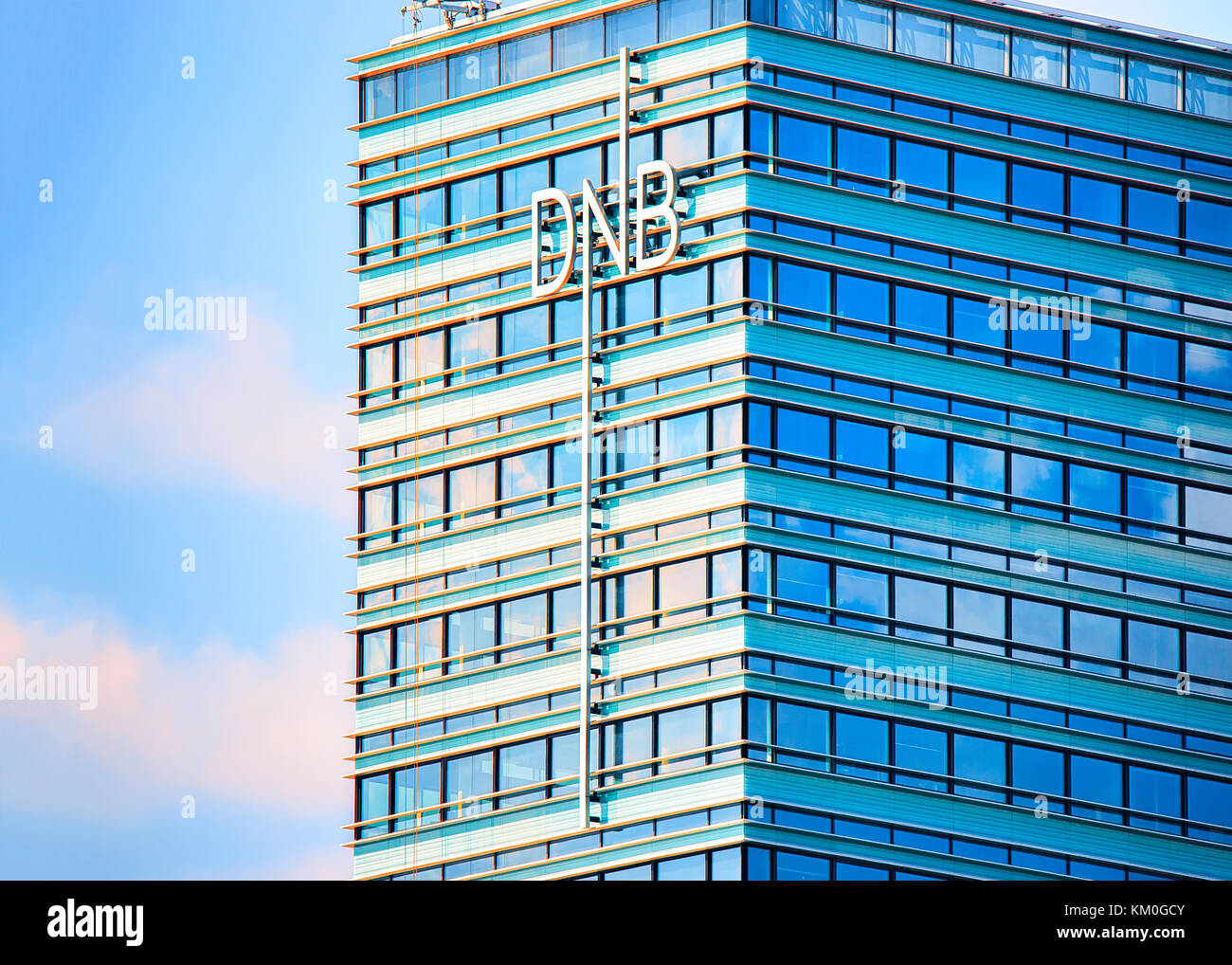 Vilnius, Lithuania - May 6, 2017: Office of DNB bank in modern skyscraper in downtown, Vilnius, Lithuania Stock Photo