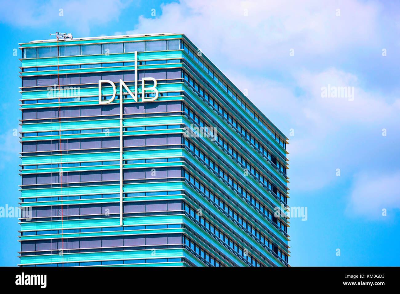 Vilnius, Lithuania - May 6, 2017: Office of DNB bank at modern skyscraper in downtown, Vilnius, Lithuania Stock Photo