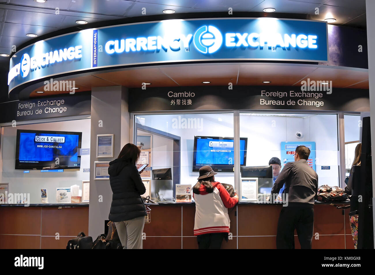 Vancouver, BC, Canada - October 13, 2017 : Motion of passengers at foreign currency exchange place inside YVR airport in Vancouver BC Canada Stock Photo