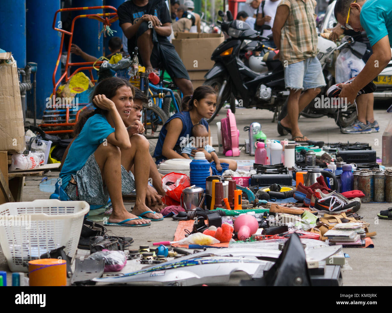 Women selling second hand goods along a sidestreet,Cebu City