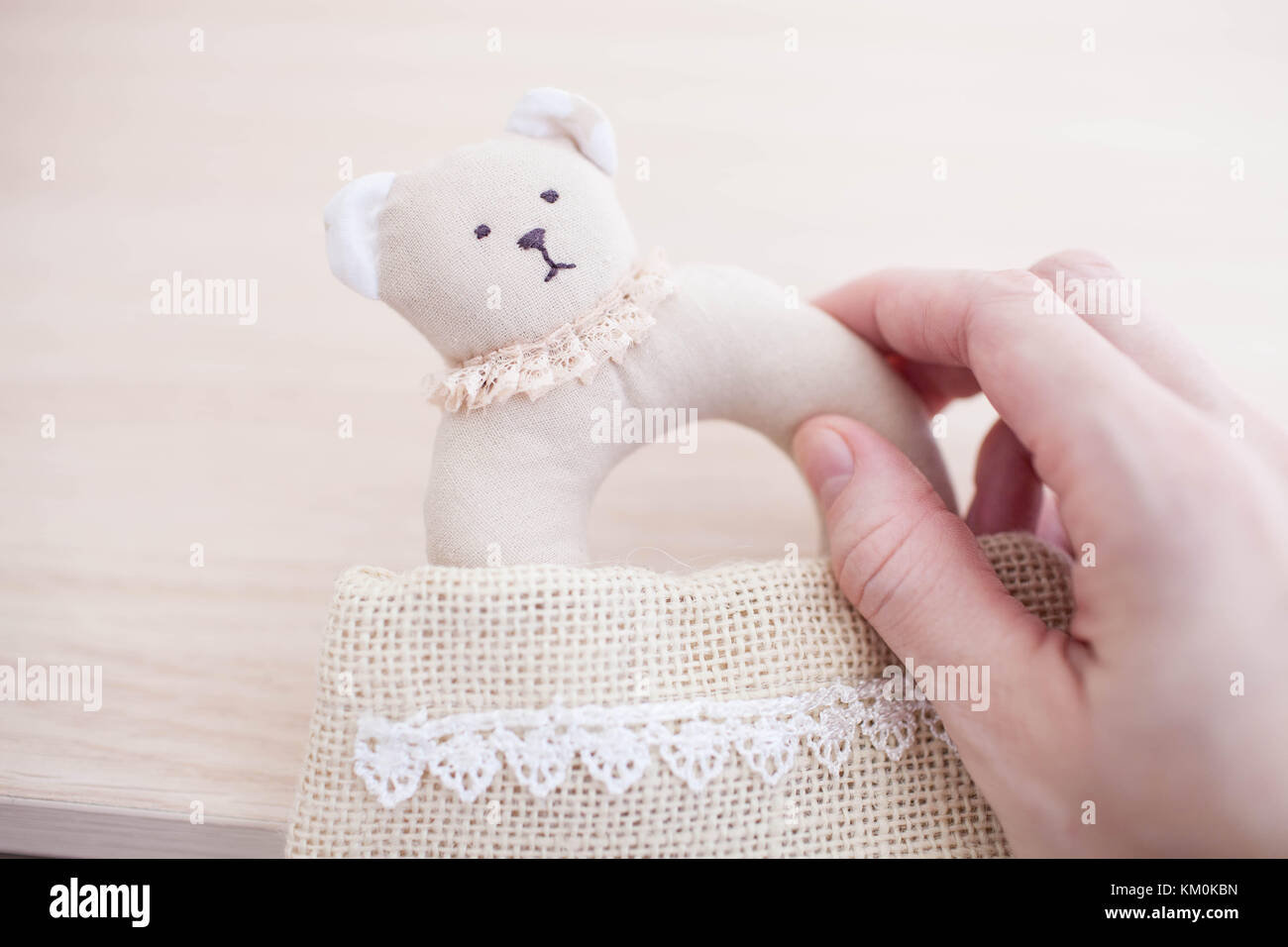 Soft rattle is handmade on white background Stock Photo - Alamy