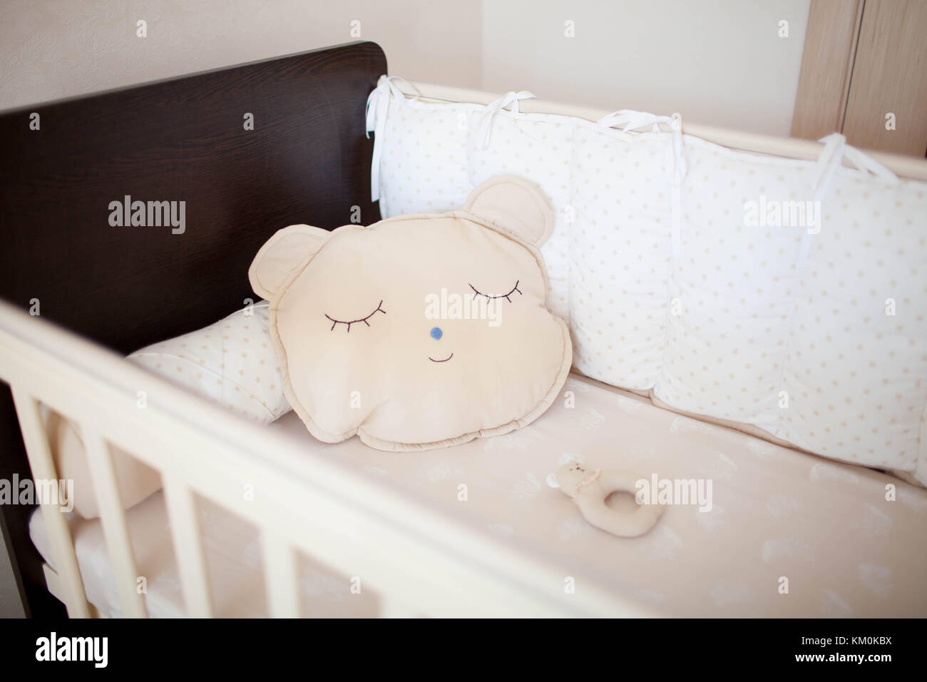 beautiful cot with pillows Stock Photo Alamy