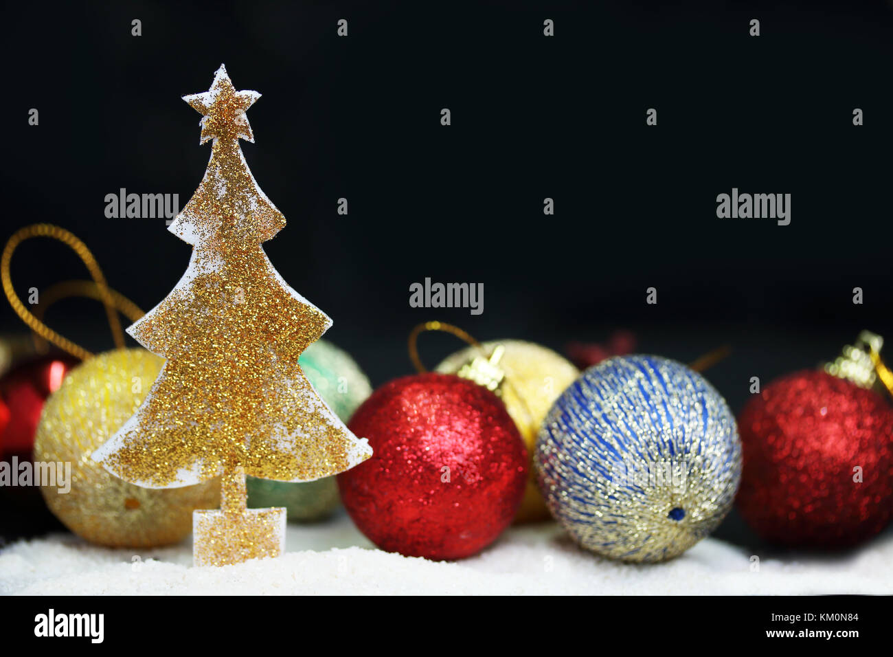 Sparkling gold glitter christmas tree with black background Stock Photo ...