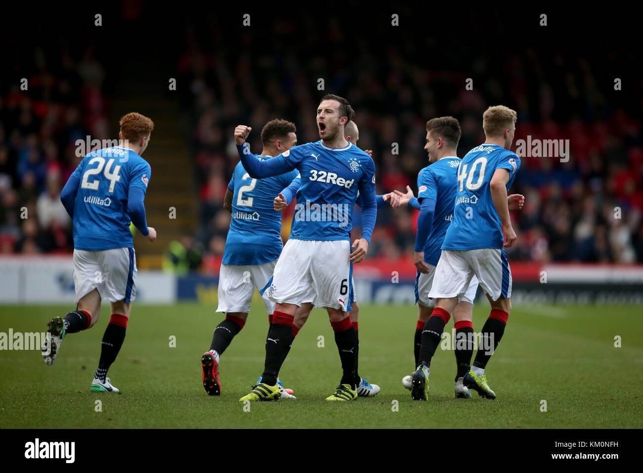 Rangers' Danny Wilson (centre) celebrates scoring his sides first goal ...