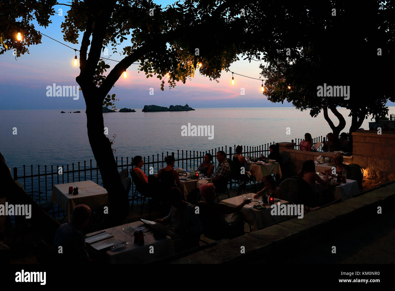 Summer sunset over the Restaurant Levanat, Lapad Bay beach, Lapad town