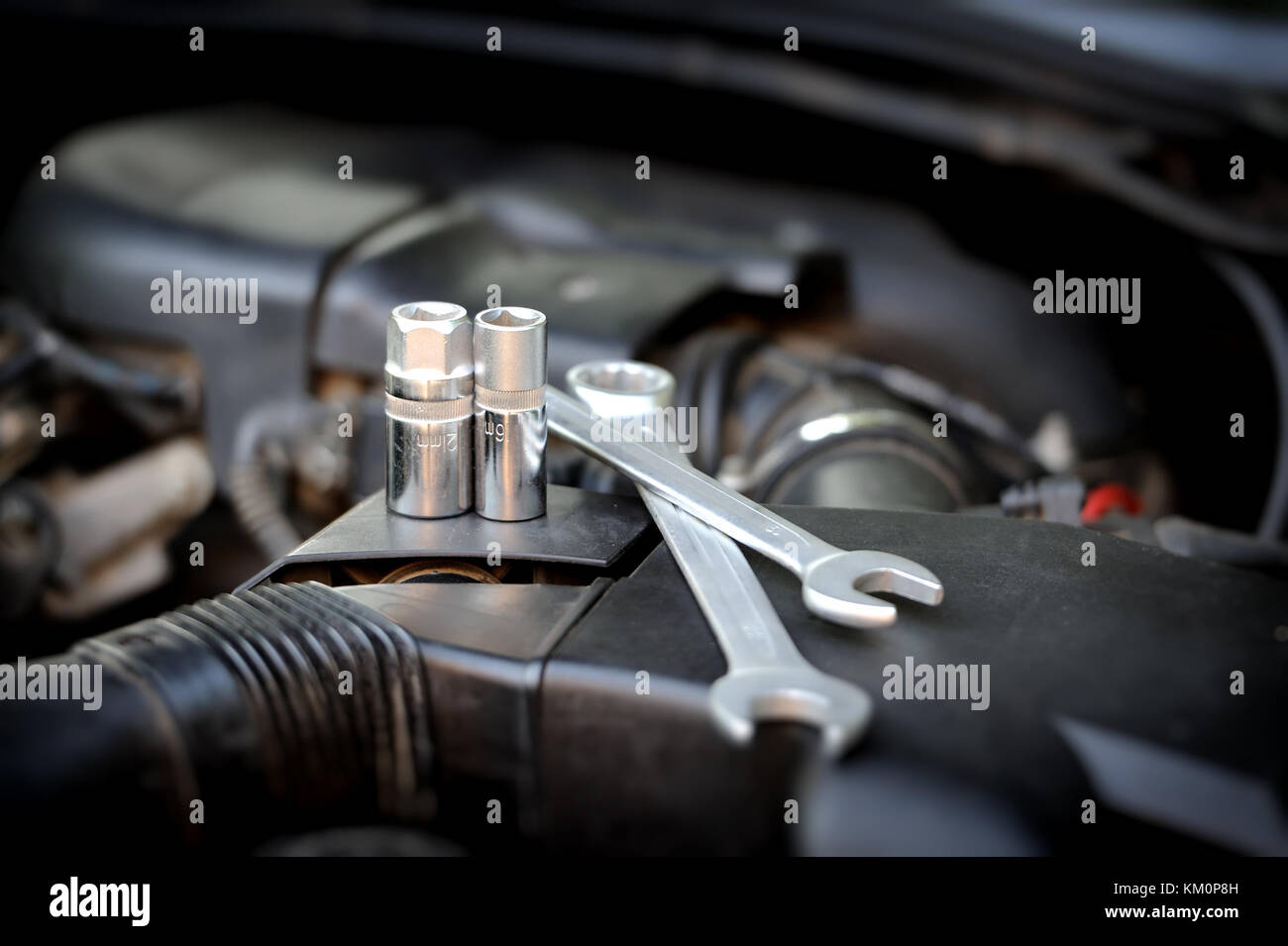 Close-up tools kit detail on auto background Stock Photo - Alamy
