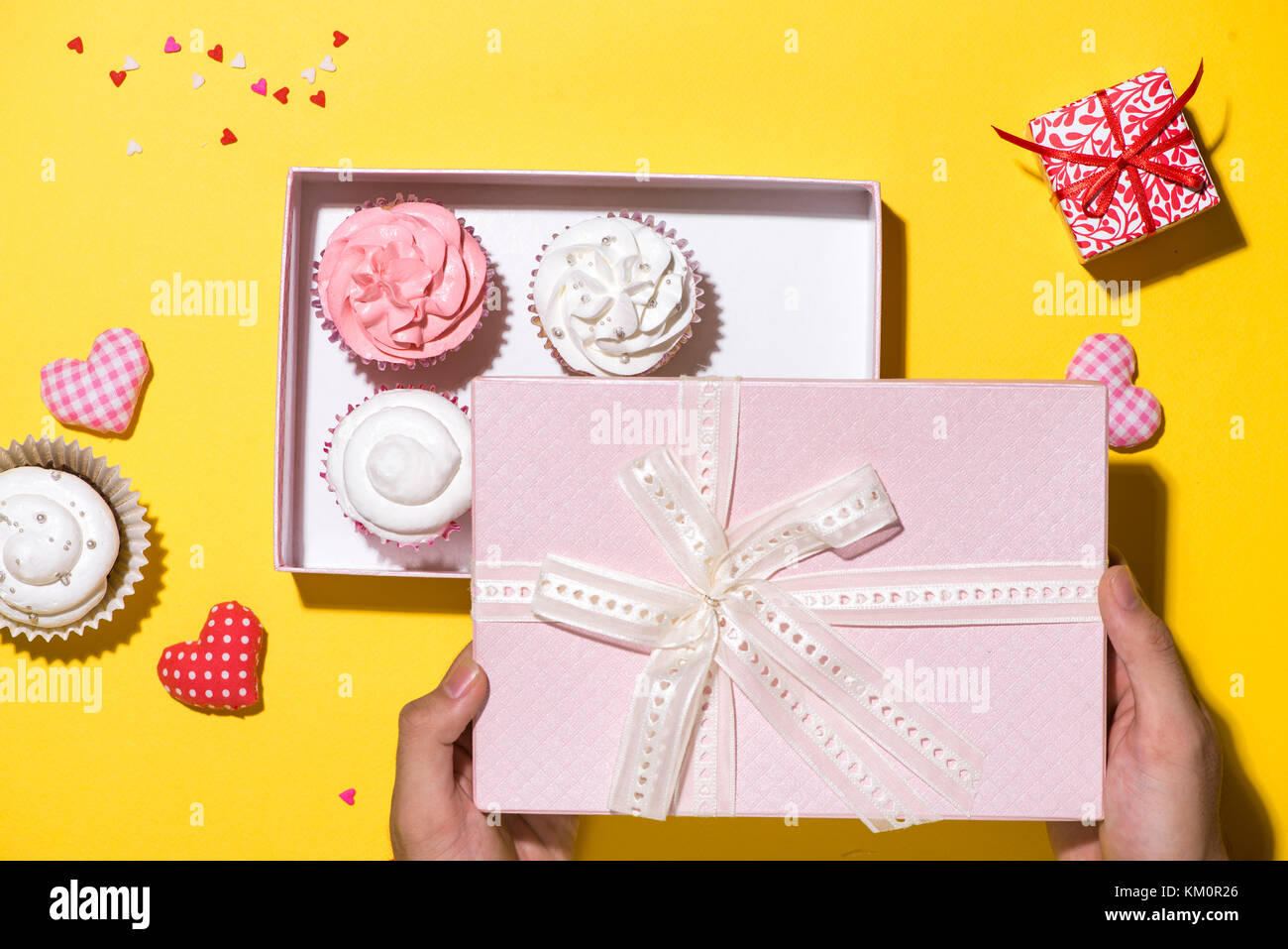 Download Delicious Cupcake With Paper Box On Yellow Background Stock Photo Alamy PSD Mockup Templates