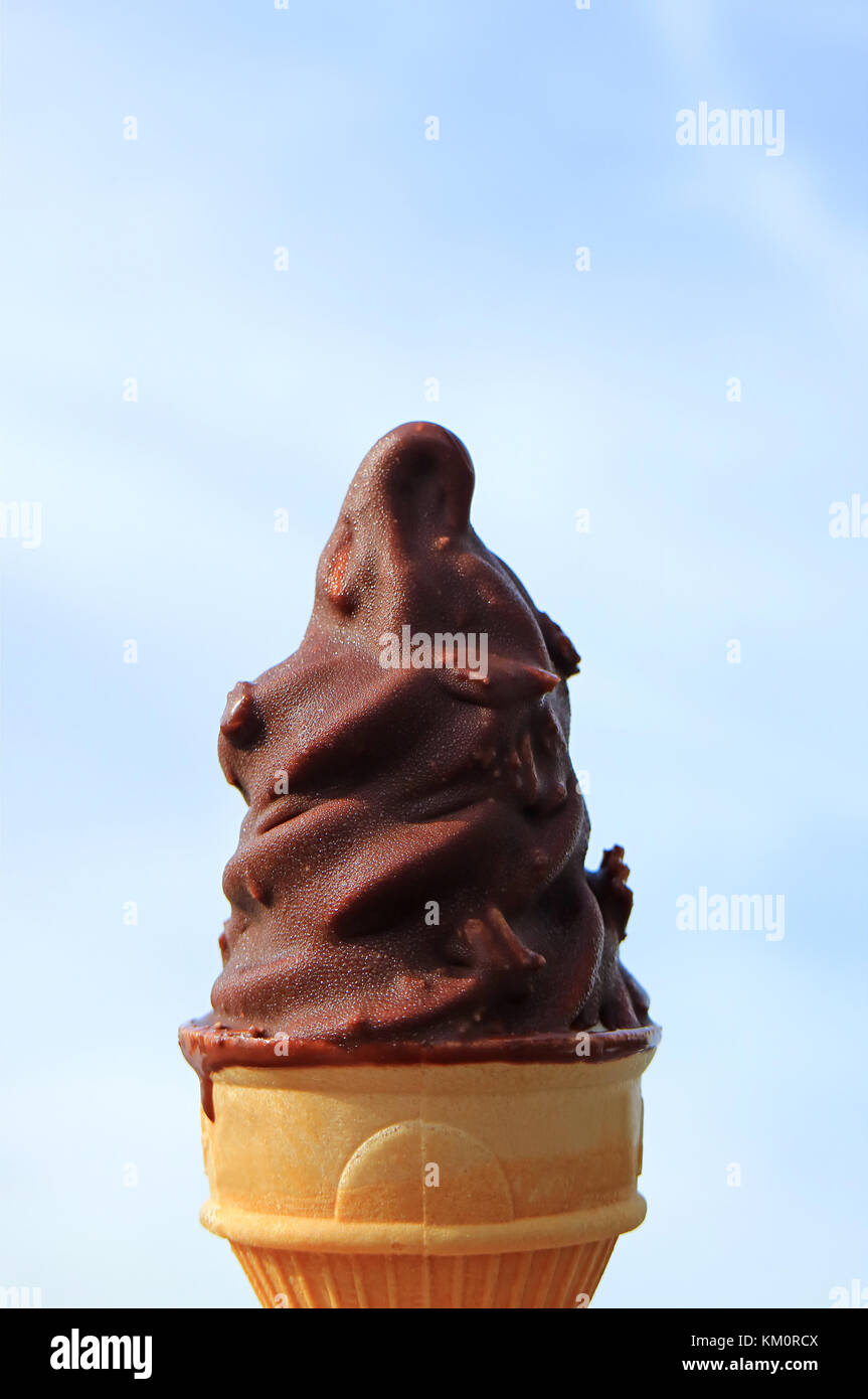 Chocolate Dipped Soft Serve Ice Cream Cone with Condensation Droplets
