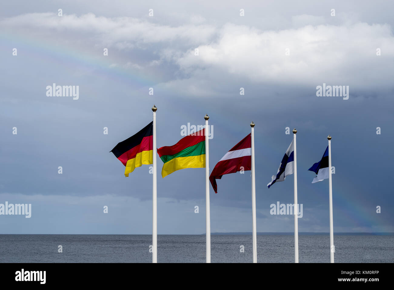 Estonian, Finnish, Lithuanian, Latvian and German flags waving in the