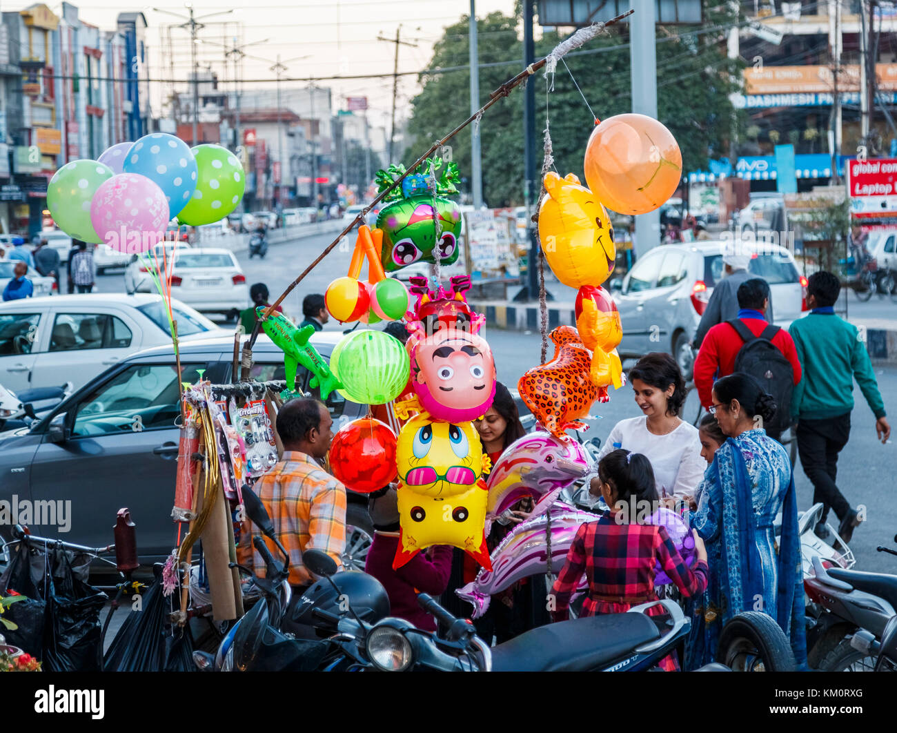 Street seller selling colourful helium balloons in Amritsar, a city in north-western India in the Majha region of the Indian state of Punjab Stock Photo