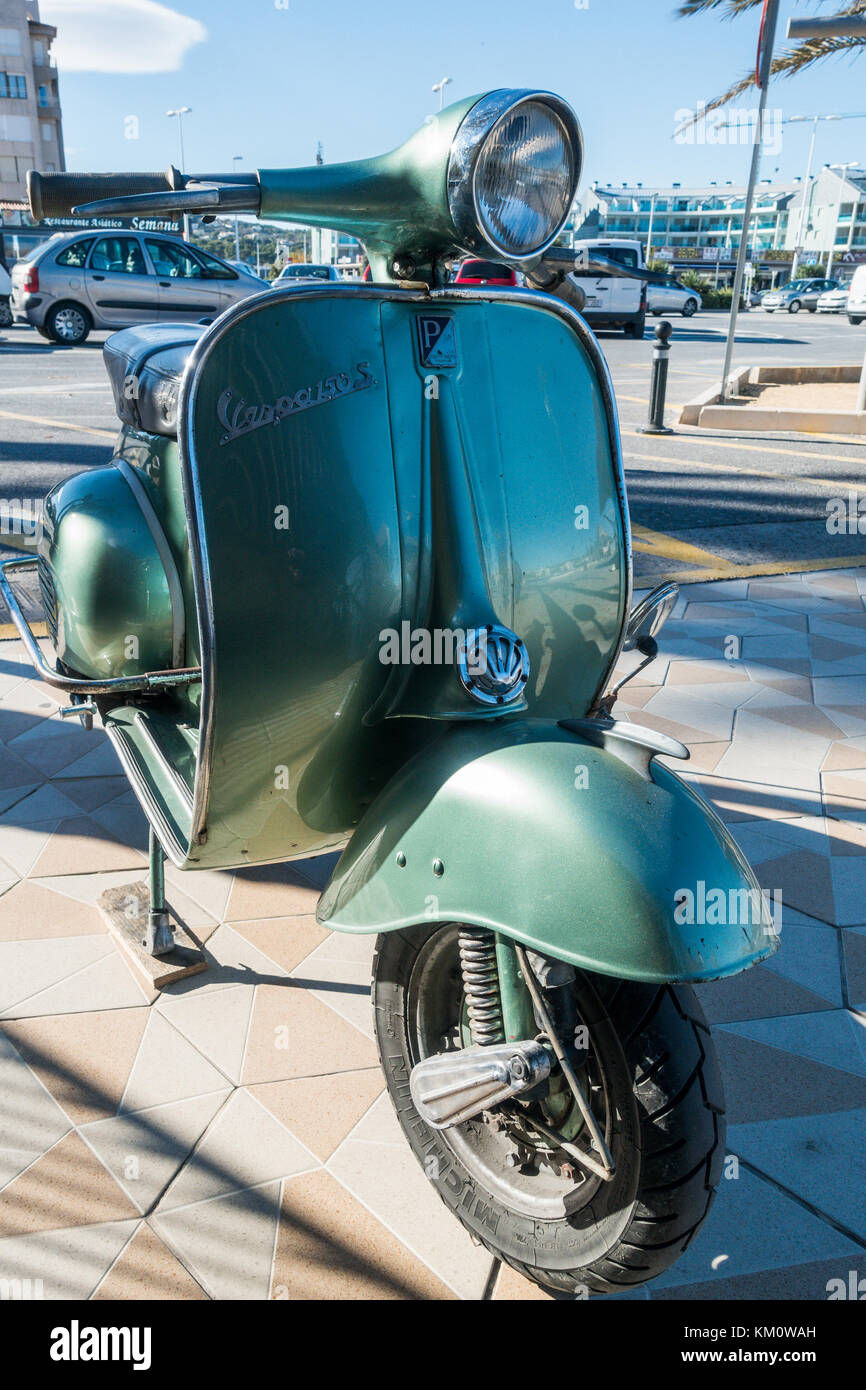 Classic green Vespa 150 super parked in Spanish street Stock Photo