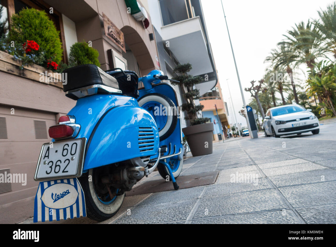 Classic blue Vespa 150 super parked in Spanish street Stock Photo - Alamy