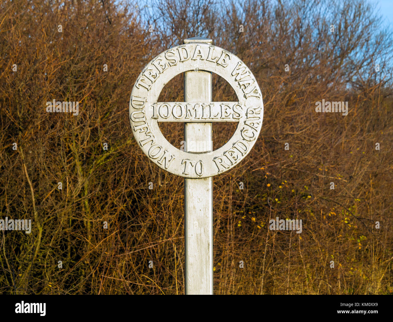 Coatham Marsh Nature reserve a sculpture of a signpost rucksack and stool marking the end of the Teesdale Way long distance walk Stock Photo