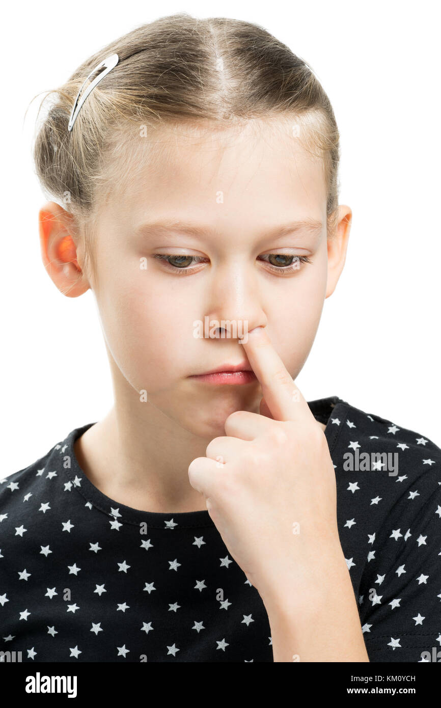 Girl finger in nose, on a white background isolated Stock Photo