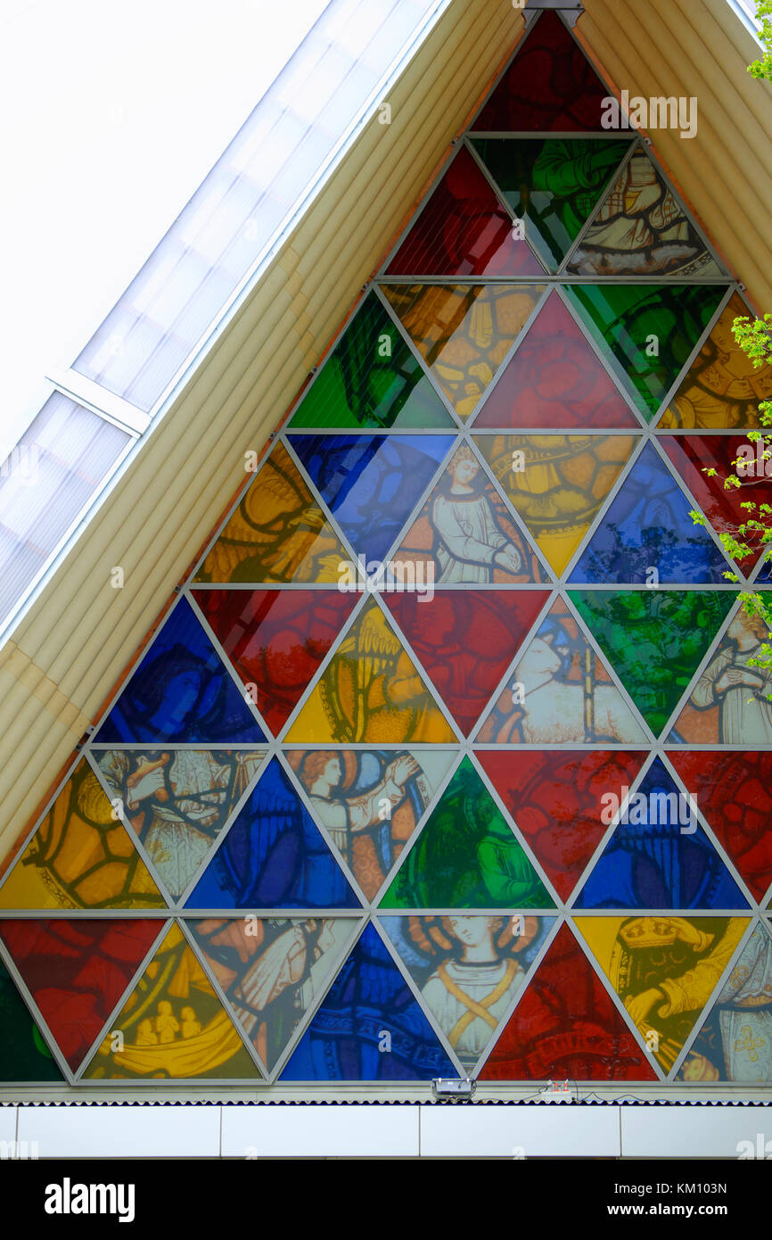 Triangular pieces of stained glass on the facade of the Cardboard ...