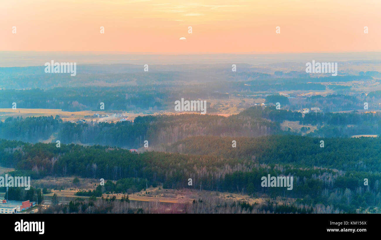 Beautiful scenery of sunset above the forest Stock Photo - Alamy