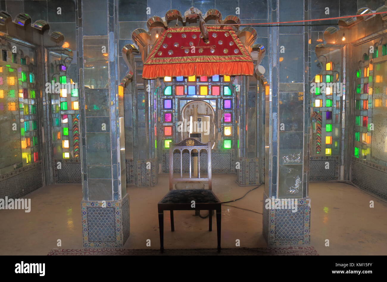 Beautiful room setting of kings at City Palace in Udaipur India Stock Photo