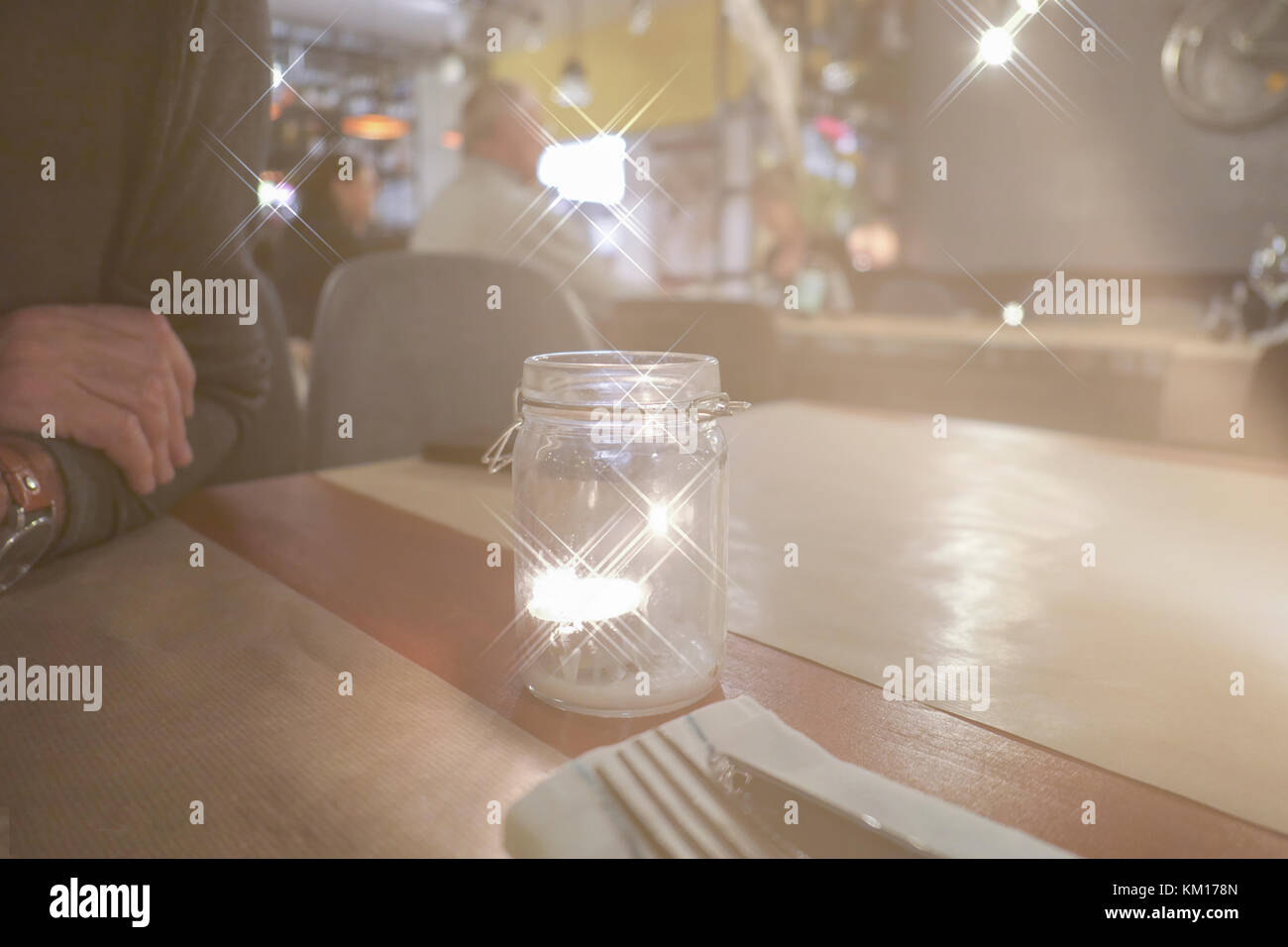 Table Light Man Man at table in restaurant with scenic lights Stock Photo - Alamy