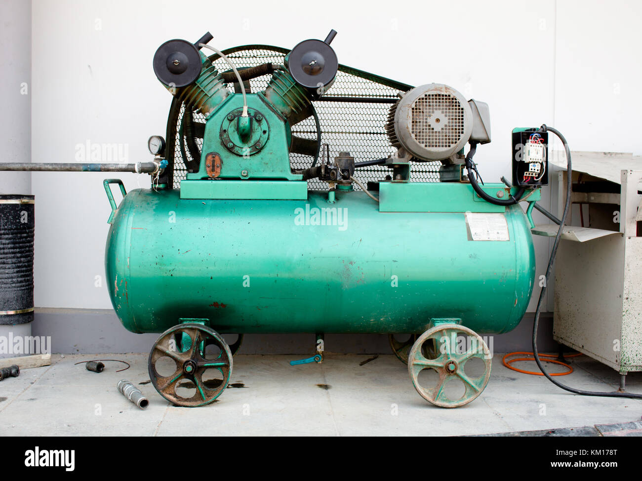 Two cylinder air compressor pump with air tank Stock Photo - Alamy