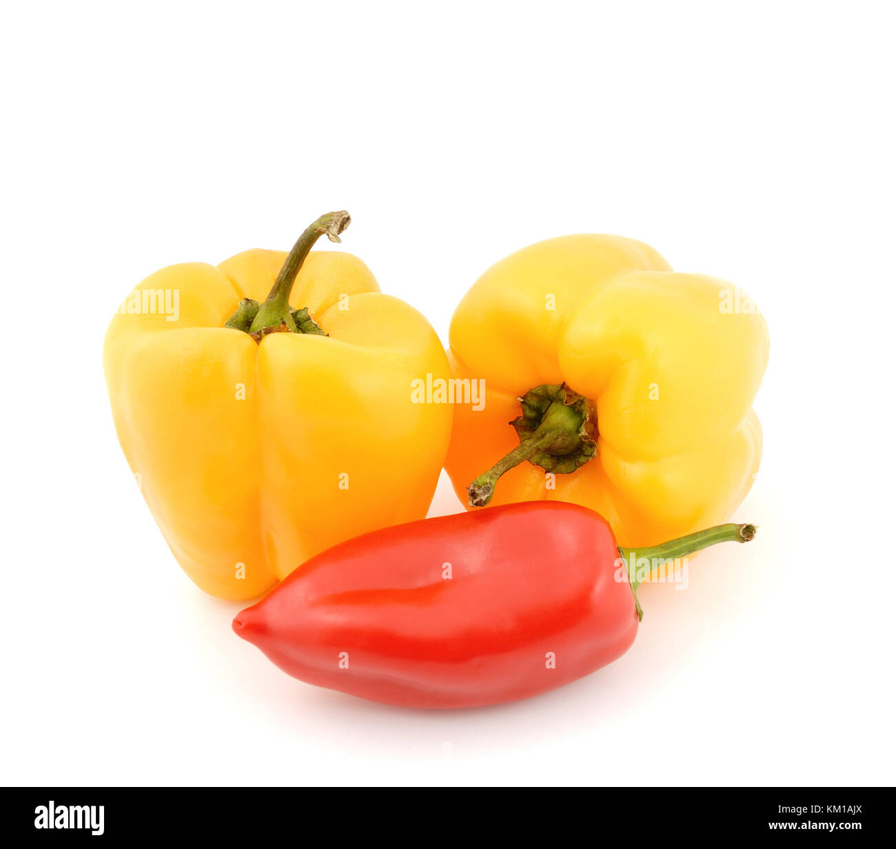 Red and yellow sweet peppers on a white background Stock Photo - Alamy