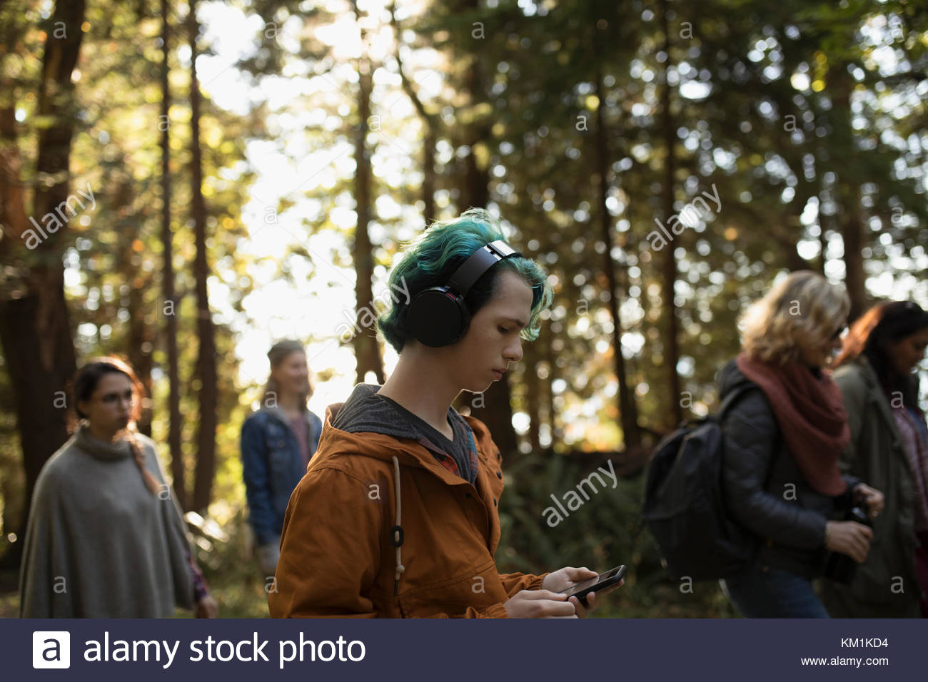 Blue-haired boy listening to music - wide 8