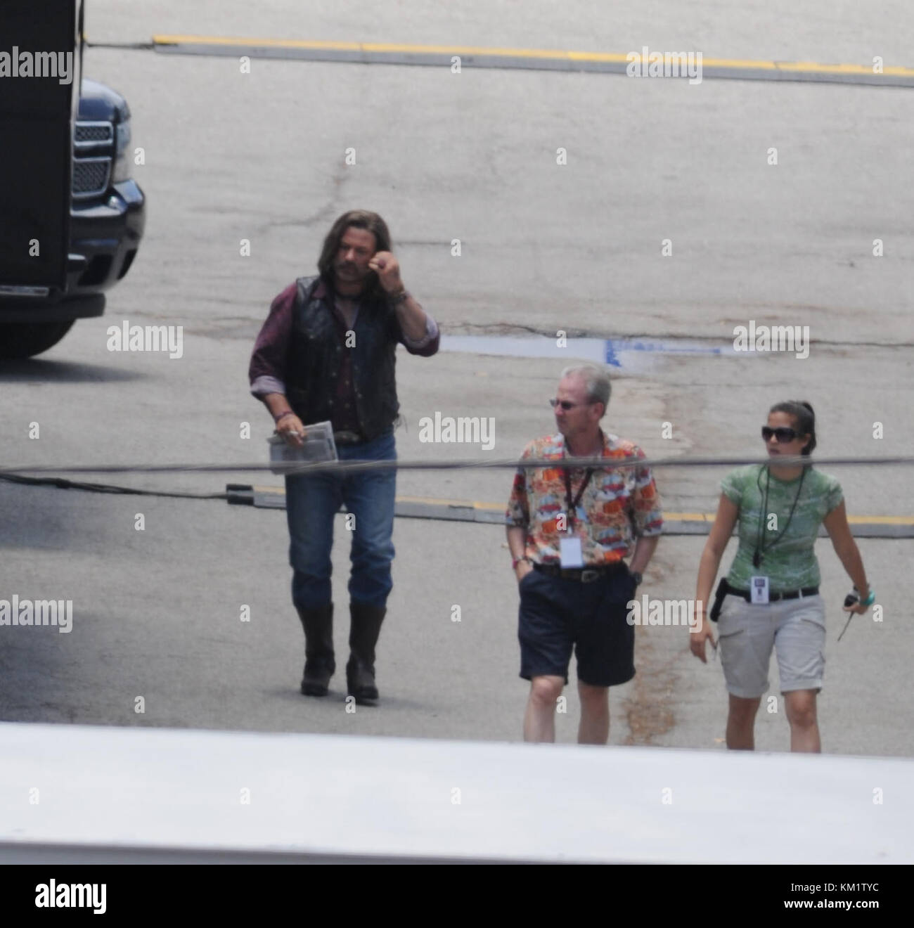 MIAMI, , FL JUNE 01 Alec Baldwin and Russell Brand Rock Out on the