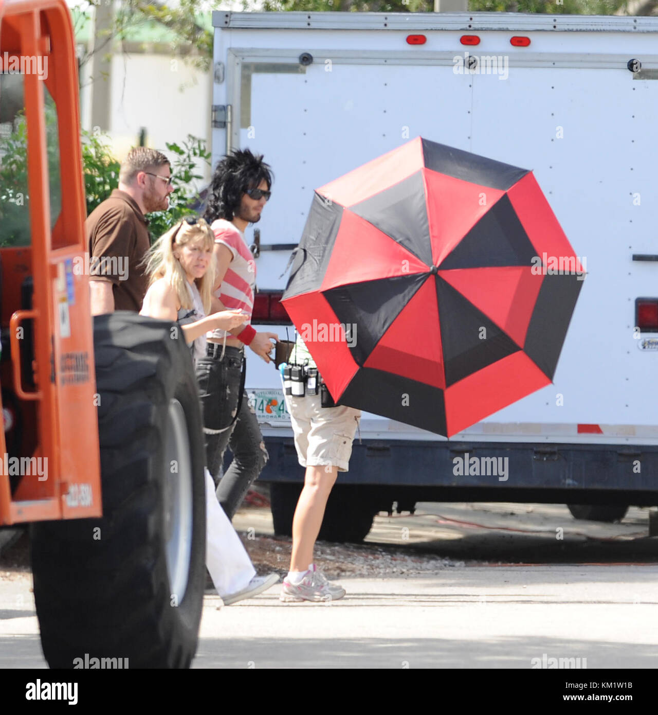 MIAMI, , FL JUNE 01 Alec Baldwin and Russell Brand Rock Out on the