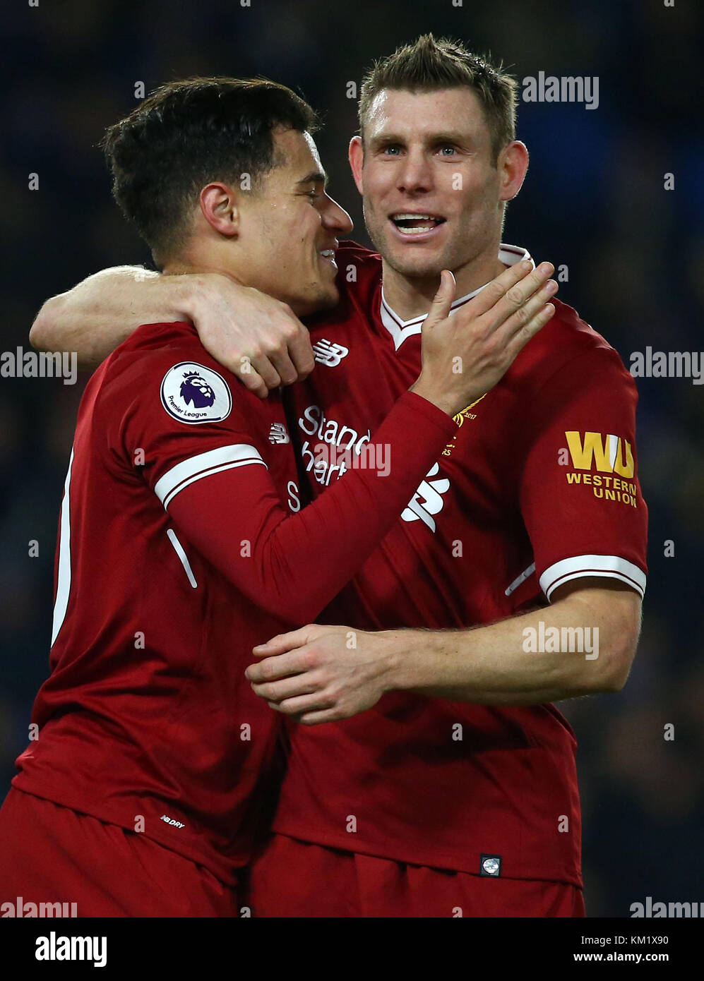 James Milner of Liverpool celebrates with goal scorer Philippe Coutinho during the Premier League match between Brighton and Hove Albion and Liverpool at the American Express Community Stadium in Brighton and Hove. 02 Dec 2017 *** EDITORIAL USE ONLY *** FA Premier League and Football League images are subject to DataCo Licence see www.football-dataco.com Stock Photo