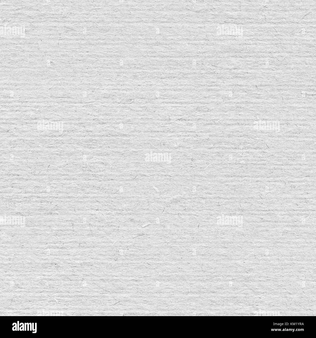 White recycled vertical note paper texture, light background. Stock Photo