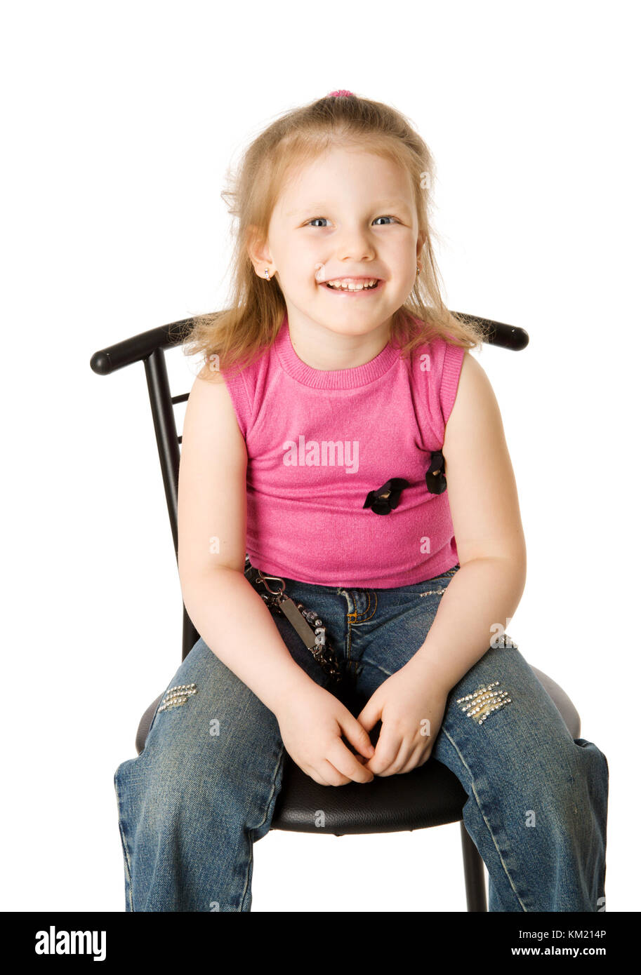 little girl sitting on chair isolated on white Stock Photo Alamy