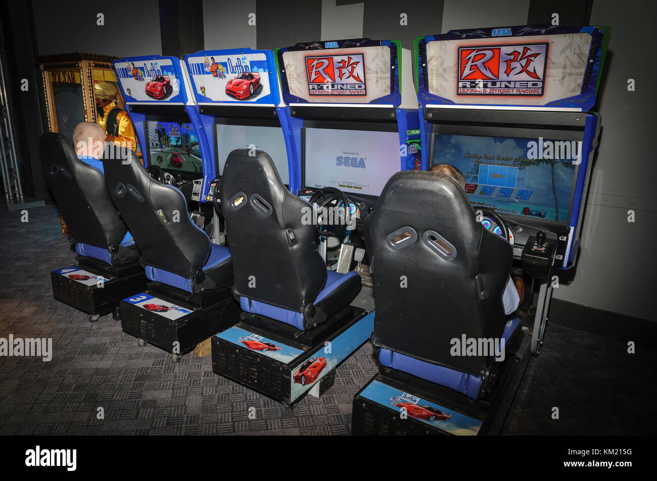 Arcade driving game machines Stock Photo Alamy