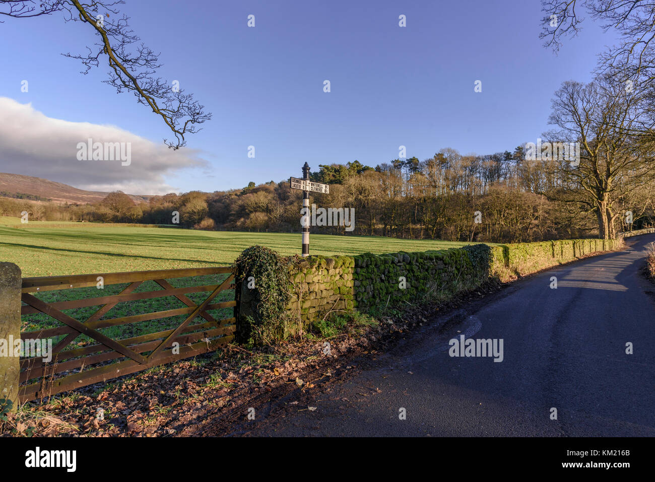 Country signpost. Lancashire. Drystone wall. country lane Stock Photo ...