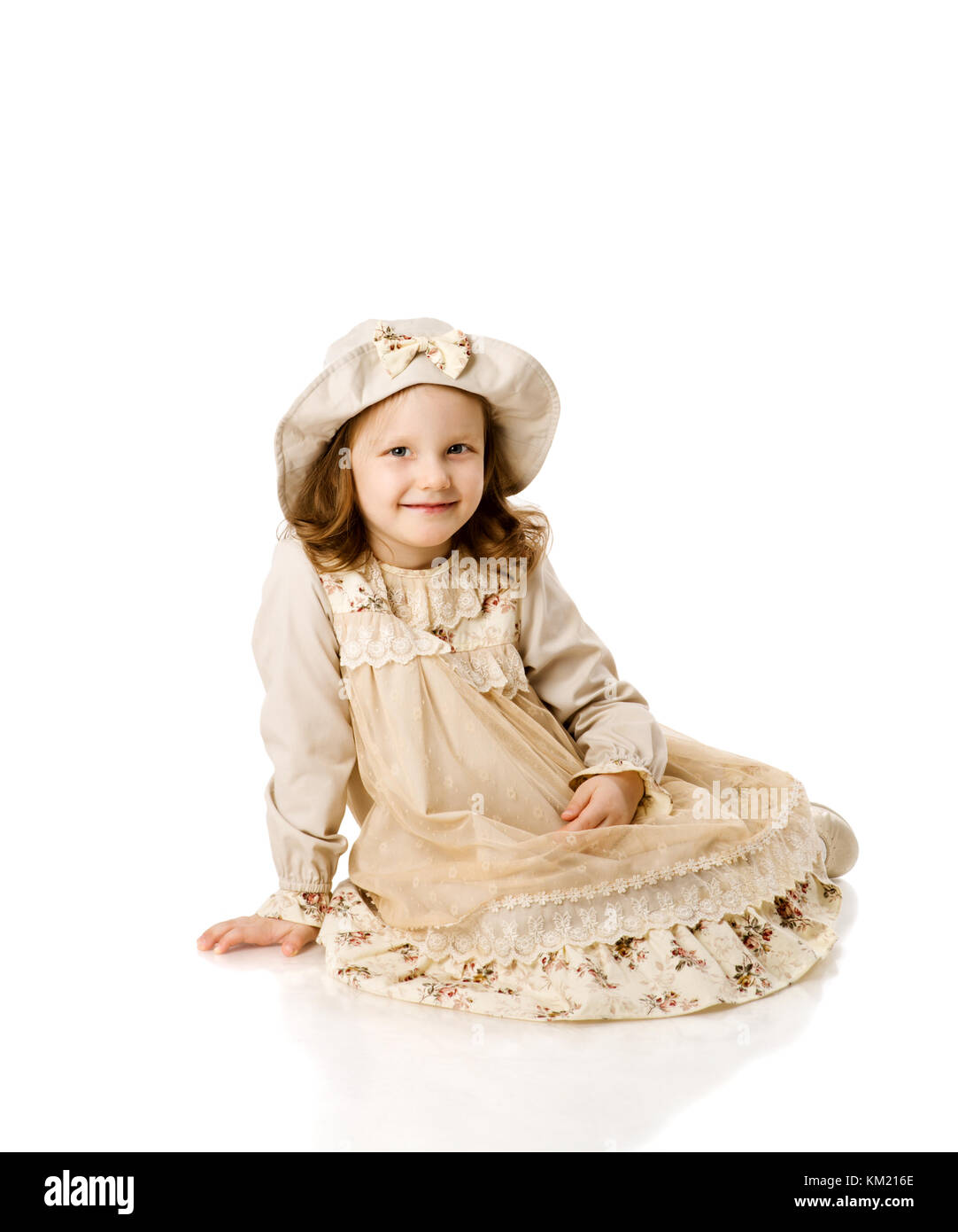 happy beautiful girl sitting on floor isolated on white Stock Photo - Alamy