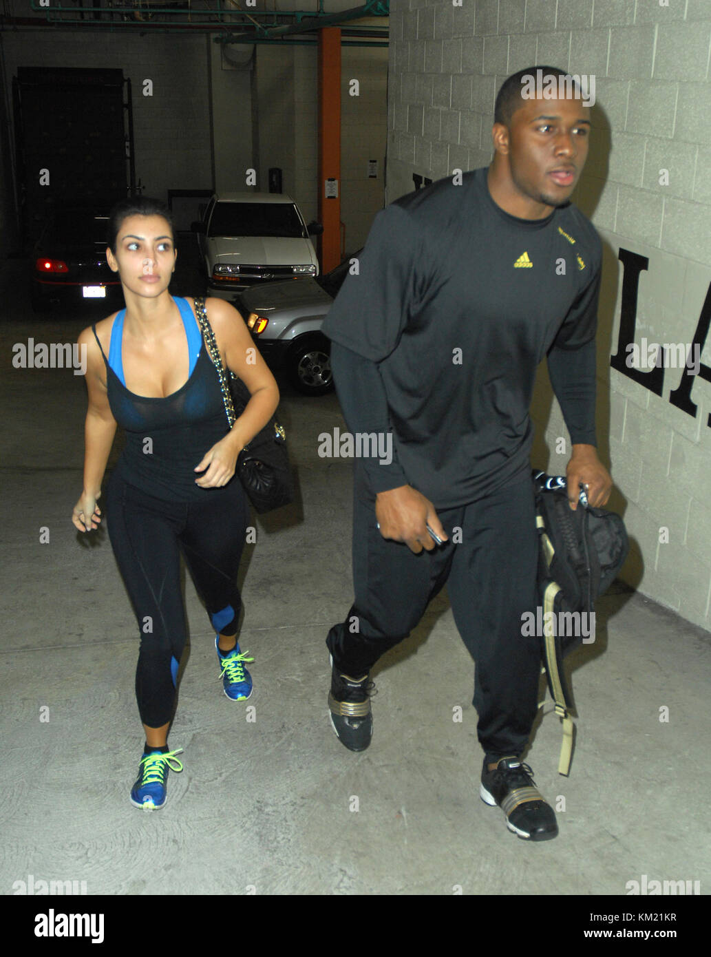 SMG_LA1_Kim Kardashian_Bush_WORKOUT_022309_08.JPG  LOS ANGELES, CA - FEBRUARY 22: Television personality Kim Kardashian and boyfriend Reggie Bush after a work out. On February 22, 2009 in Beverly Hills, California.  (Photo by Storms Media Group)  People:   Kim Kardashian, Reggie Bush Stock Photo