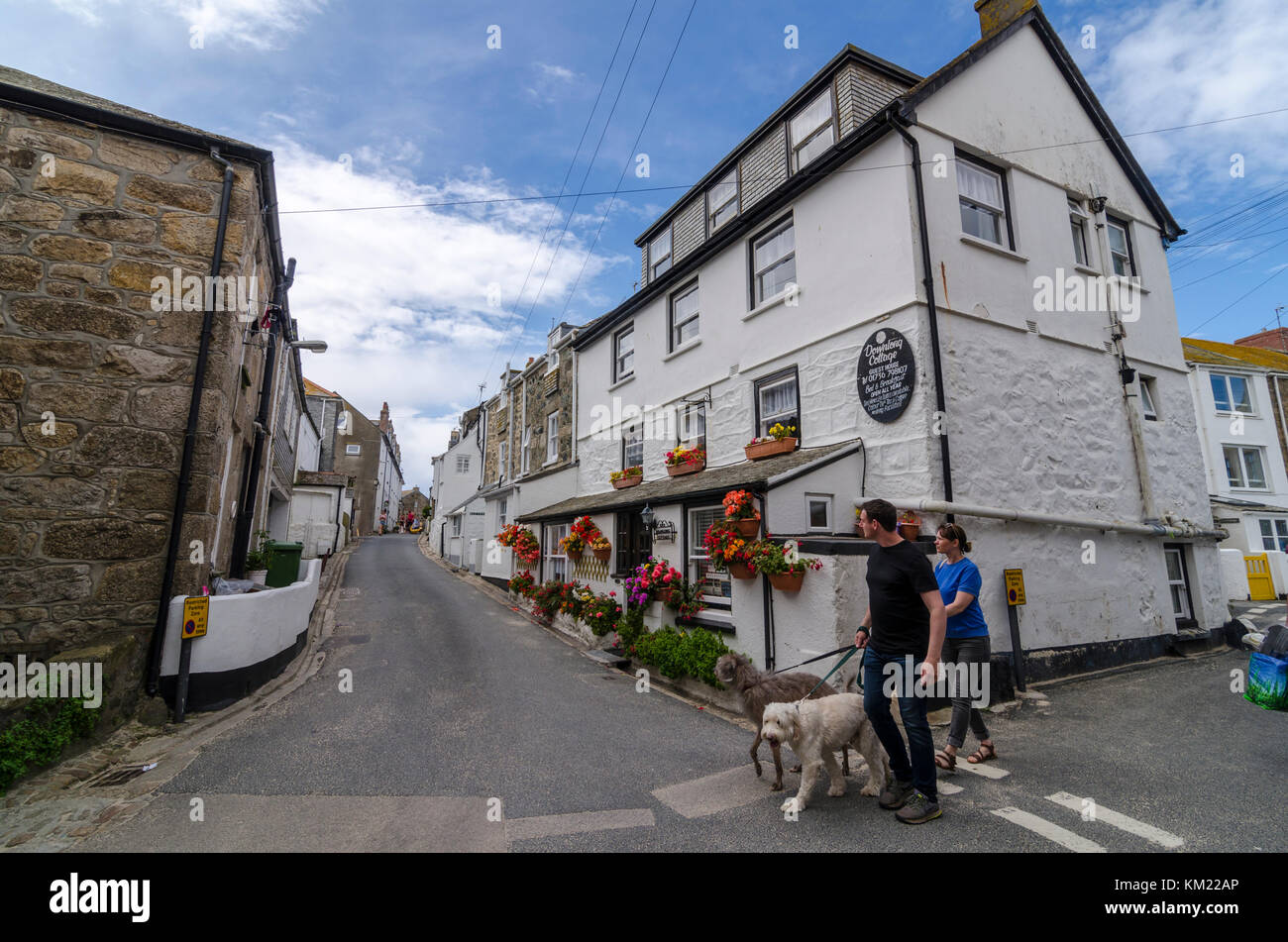 Cottages and row of terraced or terrace houses on narrow backstreets in St Ives, Cornwall, UK Stock Photo