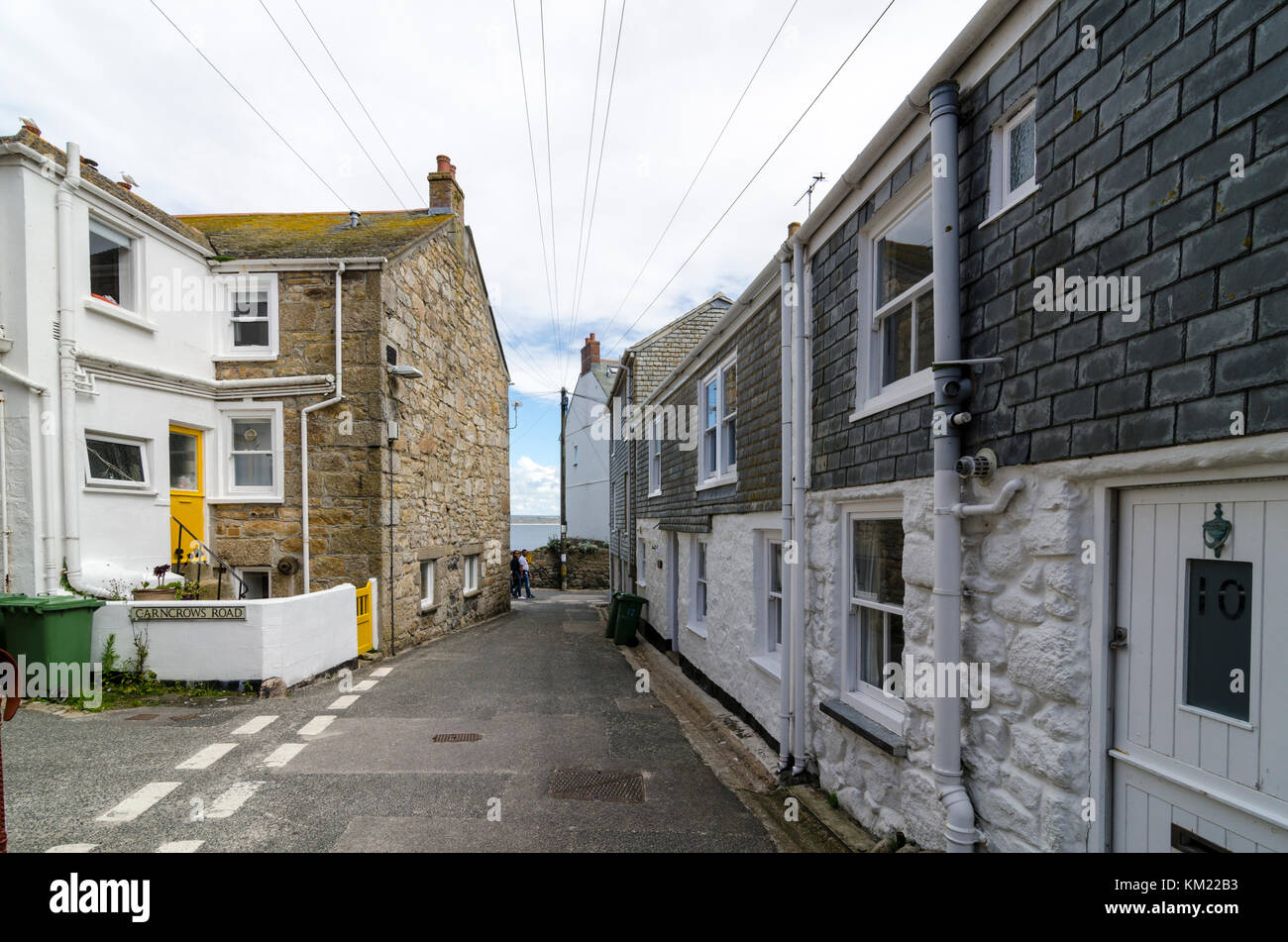 Cottages and row of terraced or terrace houses on narrow backstreets in St Ives, Cornwall, UK Stock Photo