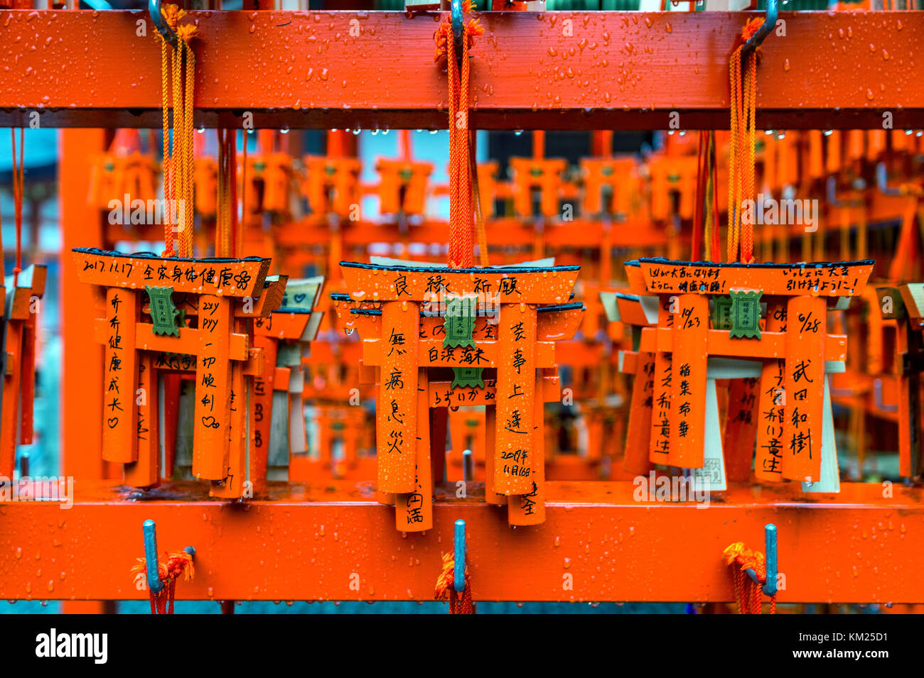 Kyoto,Japan- 18 November 2017: Torii gates model was hanging on rack after tourist used them for make a wish at Fushimi Inari shrine, Kyoto. Stock Photo