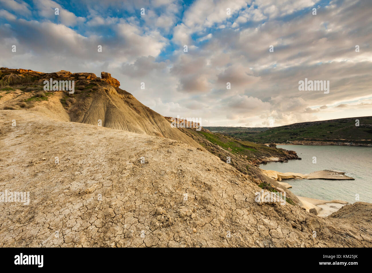 Sunset at Gnejna Bay on the west coast of Malta Stock Photo - Alamy