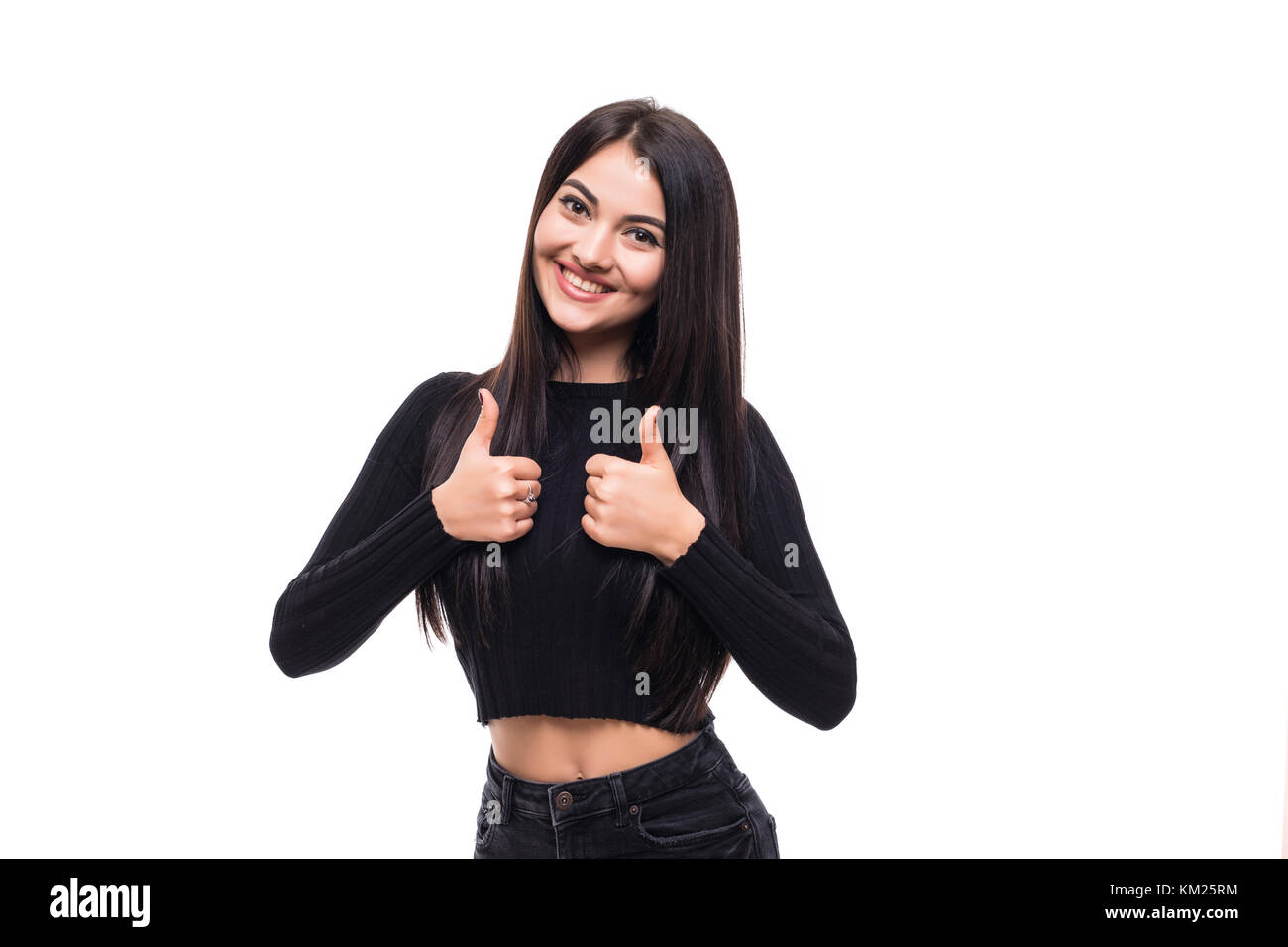 Beautiful woman porttrait showing thumbs up, isolated over a white background Stock Photo