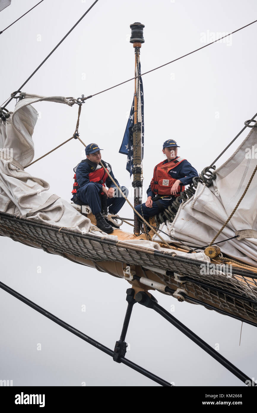 Crew aloft in the rigging of United States Coast Guard Barque 'Eagle'  during arrival in Halifax, Nova Scotia, Canada for RDV 2017. Stock Photo