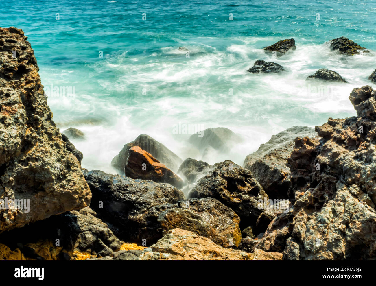 Waves hitting the rocks at Zuma Beach, long exposure, silk water Zuma