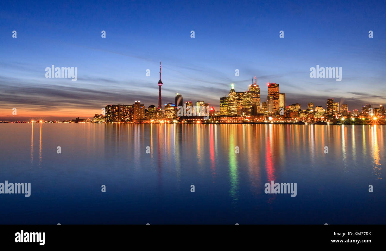 Skyline of Downtown Toronto reflected in Lake Ontario Stock Photo - Alamy