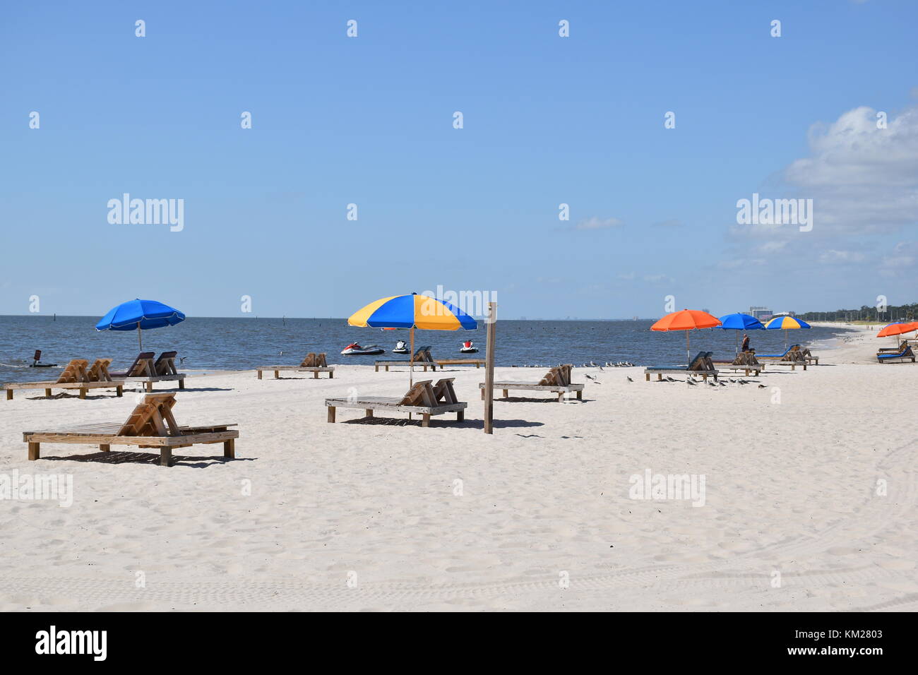 colorful umbrellas on chairs at the beach Stock Photo