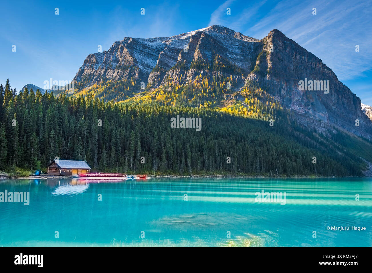 Lake Louise in Banff National Park among Rocky Mountain range Stock Photo