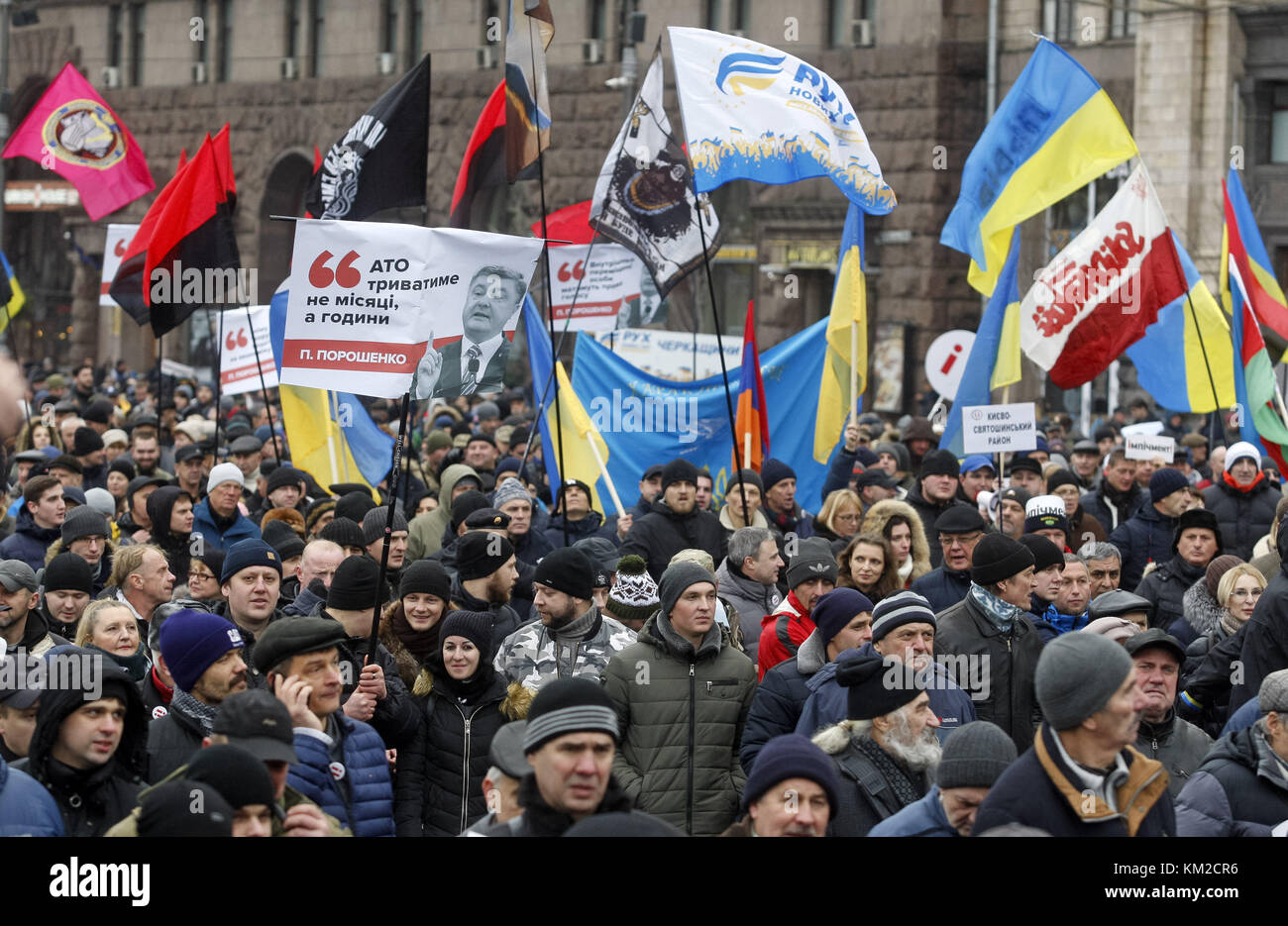 Kiev, Ukraine. 3rd Dec, 2017. Protestors carry flags and banners during ...