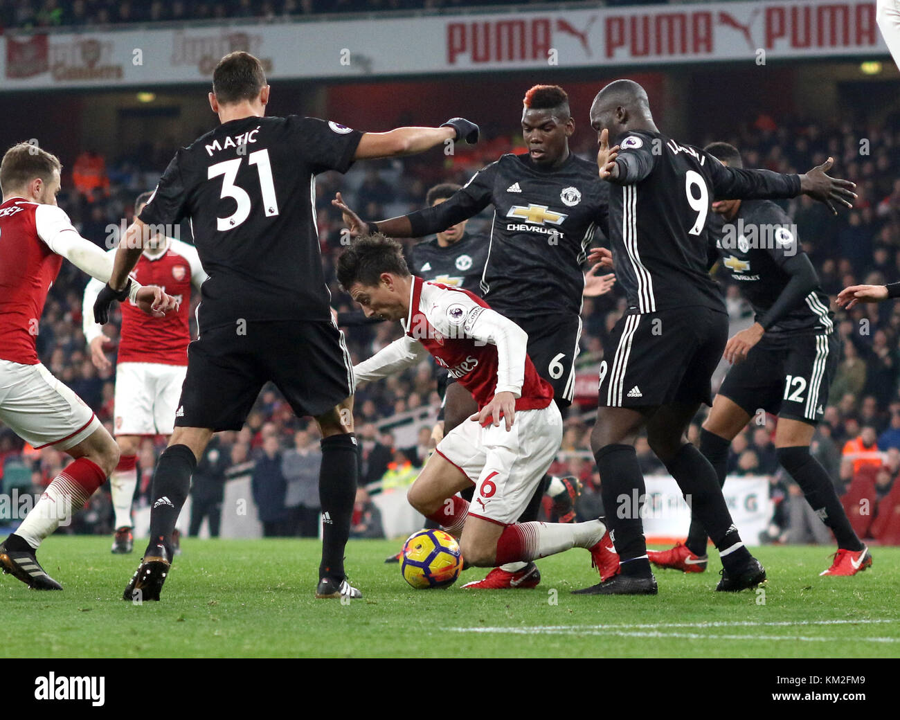 London, UK. 02nd Dec, 2017. Laurent Koscielny (A) surrounded by Nemanja Matic (MU) Paul Pogba (MU) Romelu Lukaku (MU) at the English Premier League match Arsenal v Manchester United, at The Emirates Stadium, London, on December 2, 2017. **This picture is intended for editorial use only** Credit: Paul Marriott/Alamy Live News Stock Photo