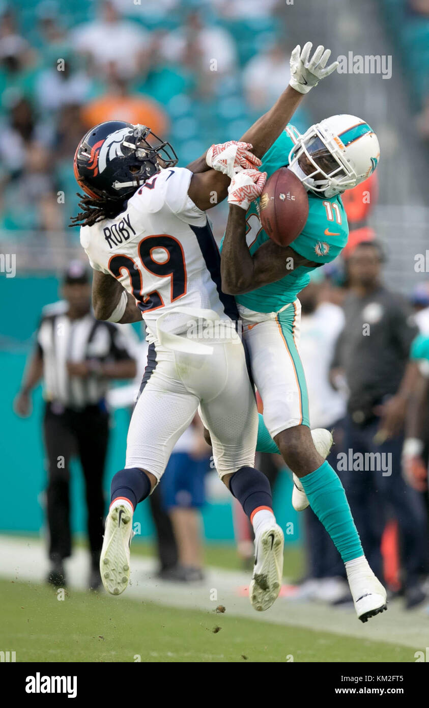 Miami Gardens, Florida, USA. 3rd Dec, 2017. Miami Dolphins wide receiver DeVante Parker (11) can't haul in a pass defended by Denver Broncos free safety Bradley Roby (29) at Hard Rock Stadium in Miami Gardens, Florida on December 3, 2017. Credit: Allen Eyestone/The Palm Beach Post/ZUMA Wire/Alamy Live News Stock Photo