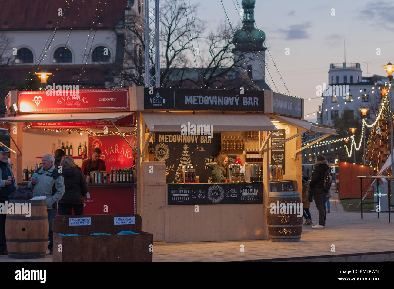 Brno,Czech Republic-November 27,2017: People is shopping mulled wine at market stalls at Christmas market on Moravian Square on November  27, 2017 Stock Photo